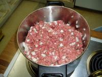 Mix up the onions into the uncooked beef